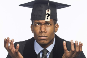 Image of college graduate with a question mark tag on his graduation cap.